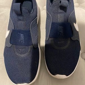 Nike slip on tennis shoe, blue color size 9.5 us